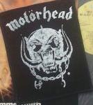 Detail of the front cover of a sealed copy that includes the patch
